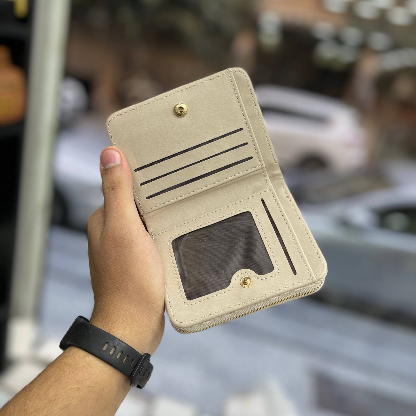 Product Name:
Elegant Beige Leather Wallet with Gold Ring Accent