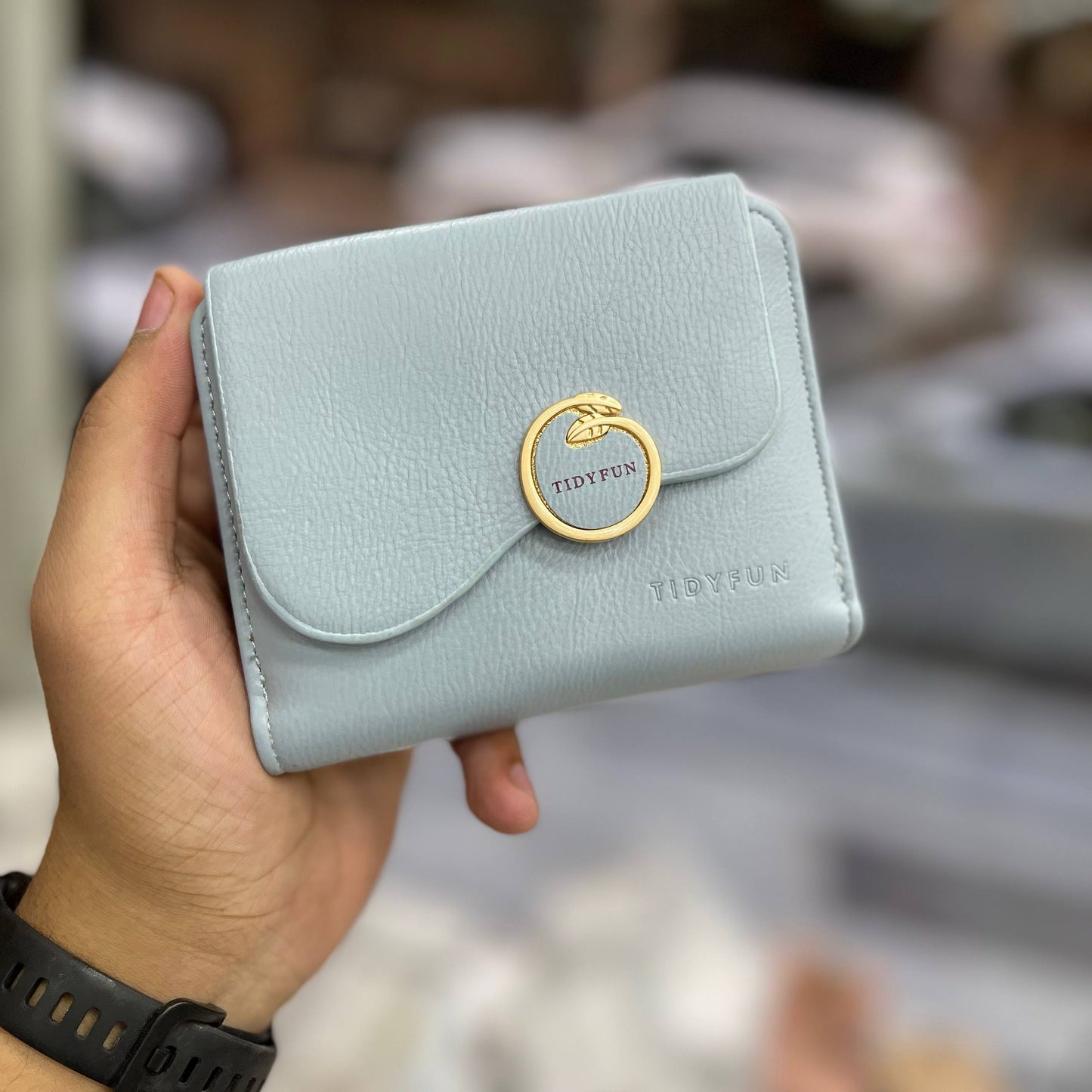 Product Name:
Elegant Beige Leather Wallet with Gold Ring Accent