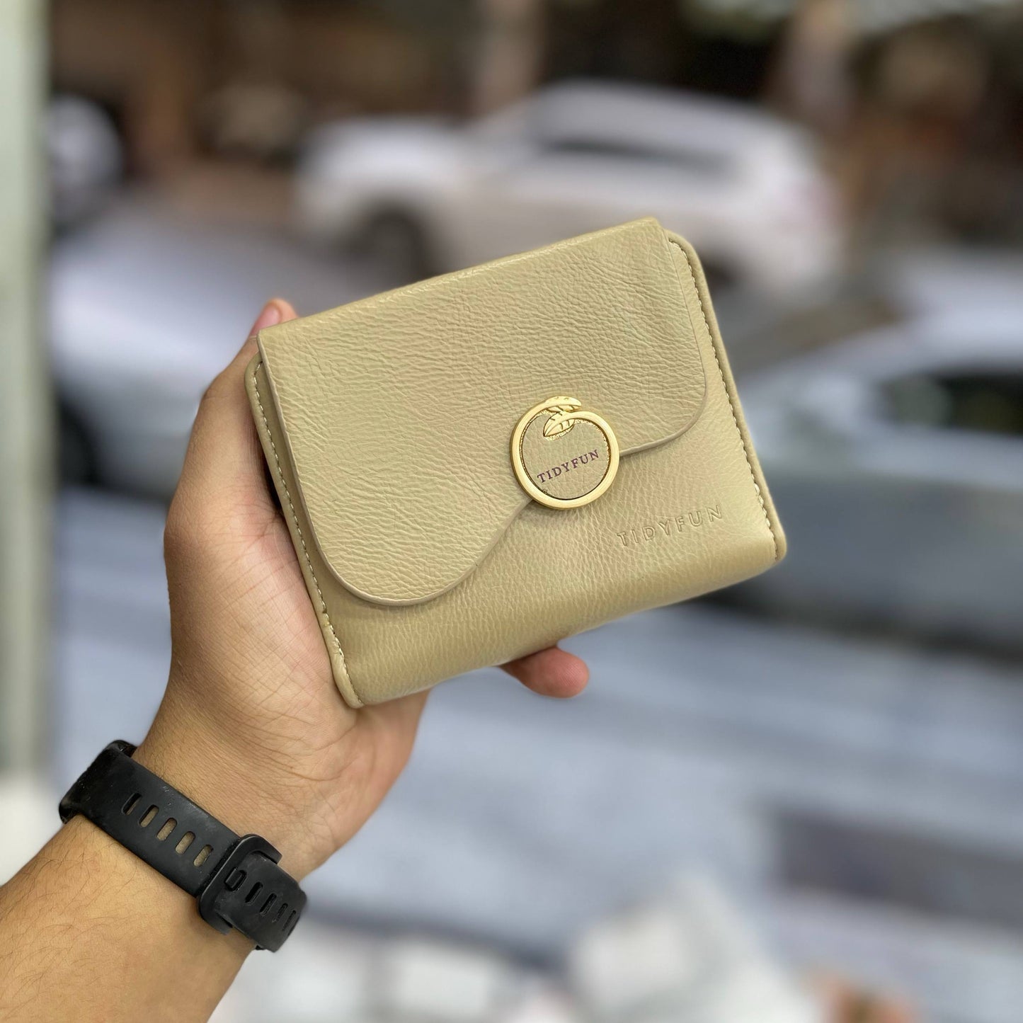 Product Name:
Elegant Beige Leather Wallet with Gold Ring Accent