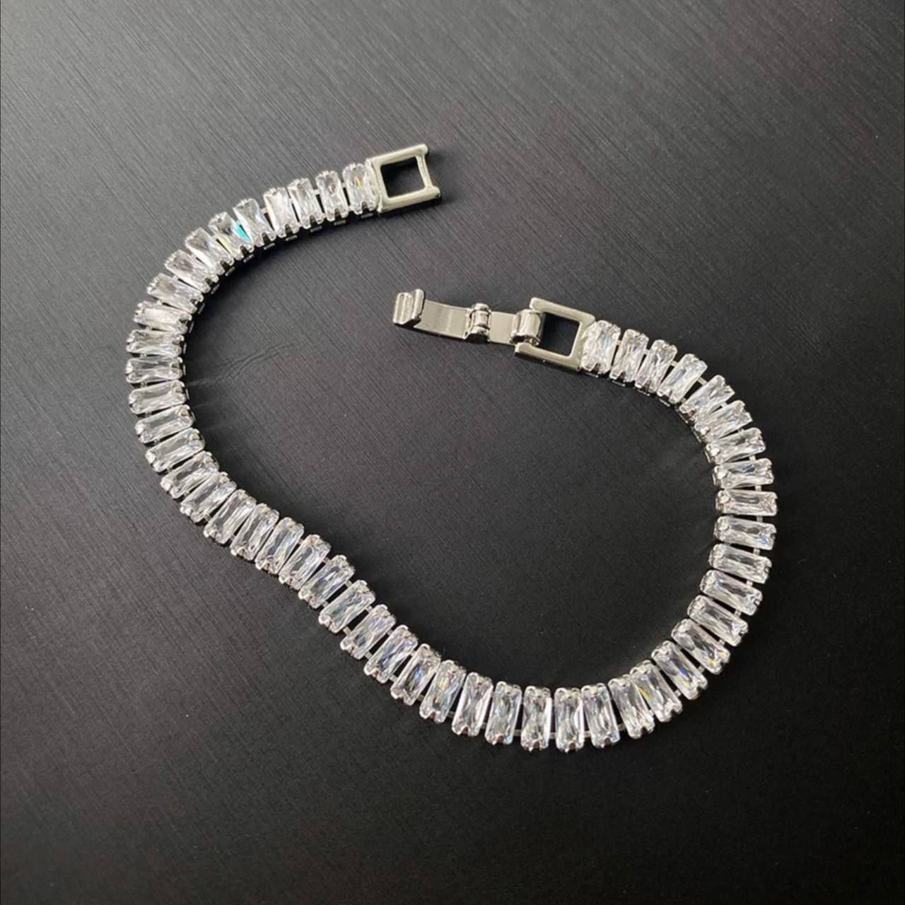 Product Name

Large Baguette Bracelet – Chinese Gold Plated with Zircon Stones