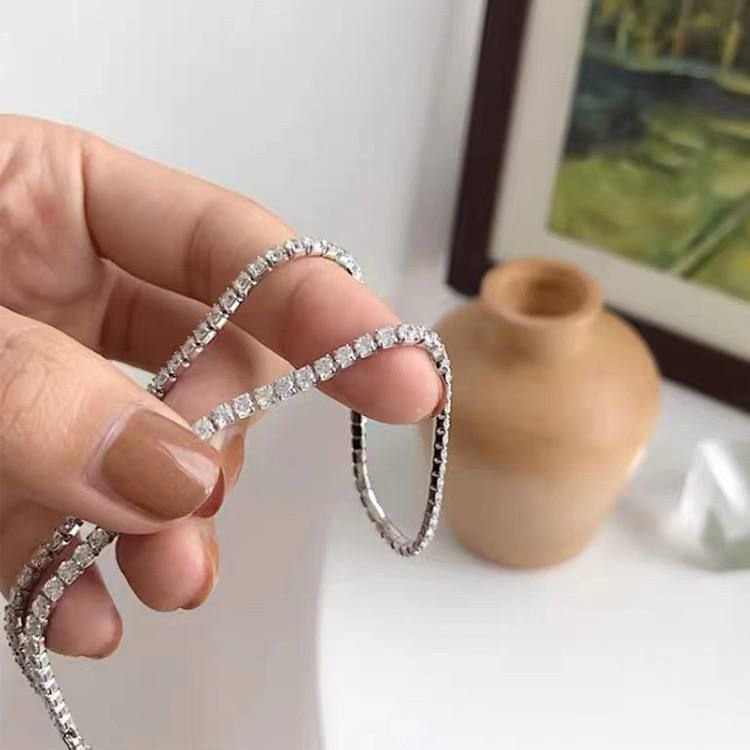 Product Name

Chinese Gold-Plated Tennis Necklace – 3 mm Stones, 40 cm