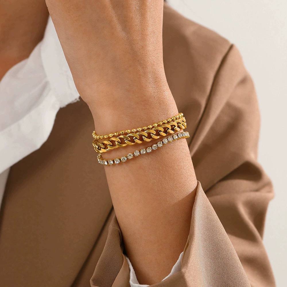 Product Name:
Triple Layer Gold-Plated Bracelet with Sparkling Stones