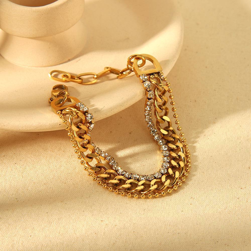 Product Name:
Triple Layer Gold-Plated Bracelet with Sparkling Stones