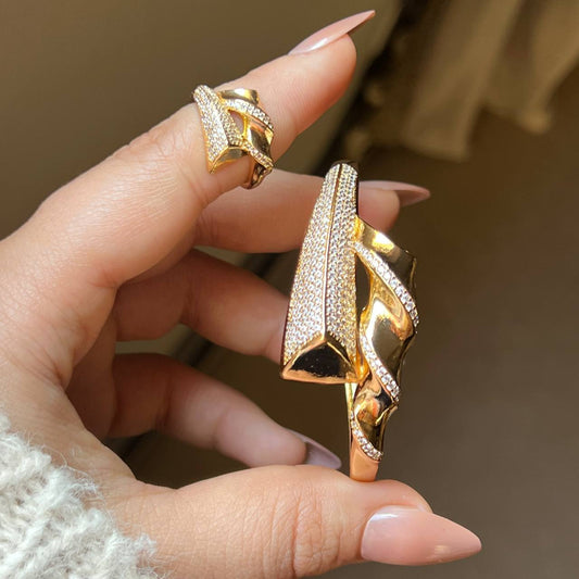 Product Name:

Gold-Plated Bracelet and Ring Set with Zircon Stones