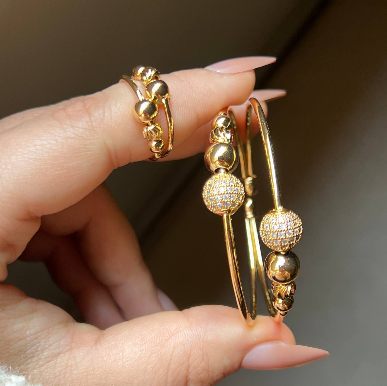 Product Name:
Gold-Plated Bracelet and Ring Set with Zircon Stones – Typical Gold Design