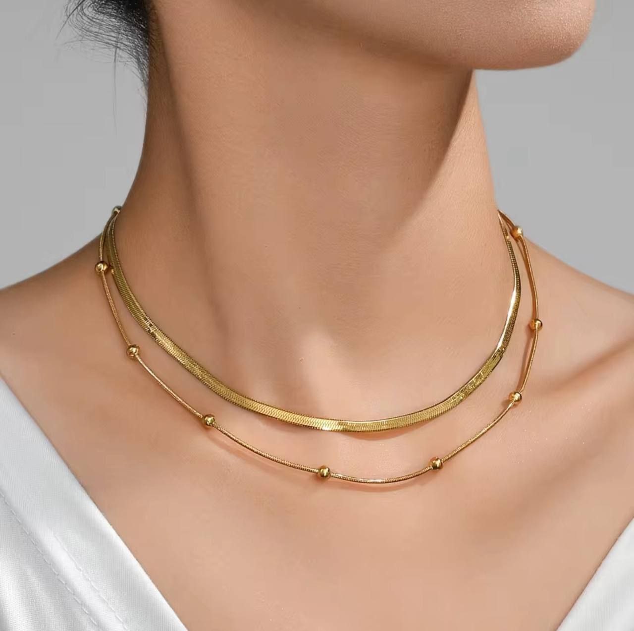 Product Name 

Pure Stainless Steel 316 Double-Layer Fox Tail × Snake Chain Necklace