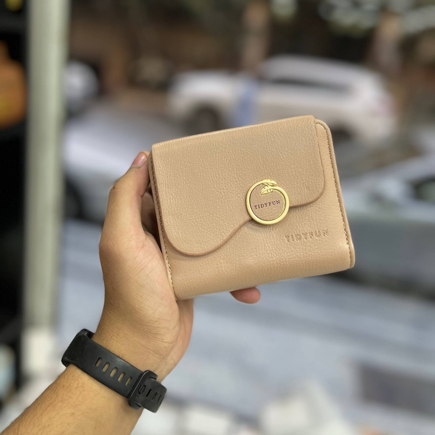 Product Name:
Elegant Beige Leather Wallet with Gold Ring Accent