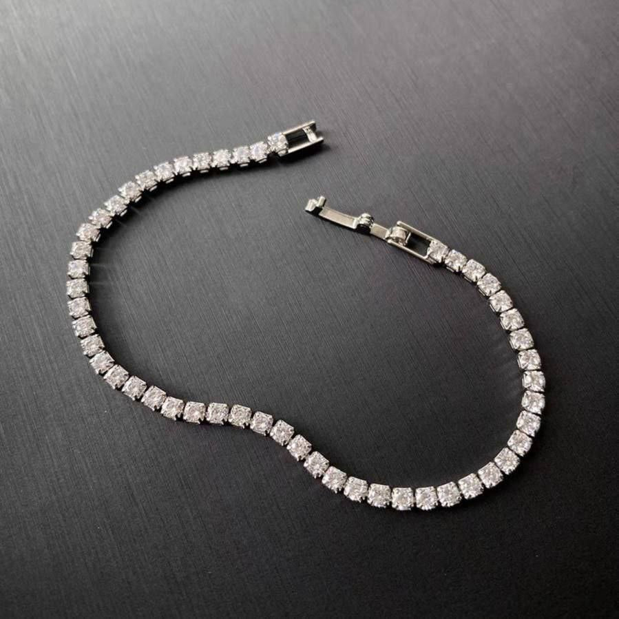 Product Name

Chinese Gold-Plated Tennis Bracelet – 2 mm Zircon Stones